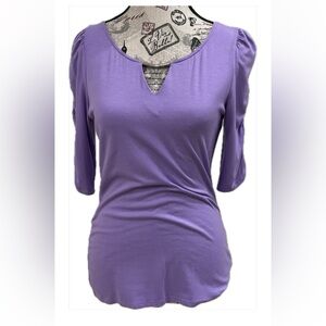 White House Black market purple keyhole top